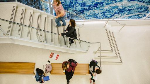 Students walking up staircase